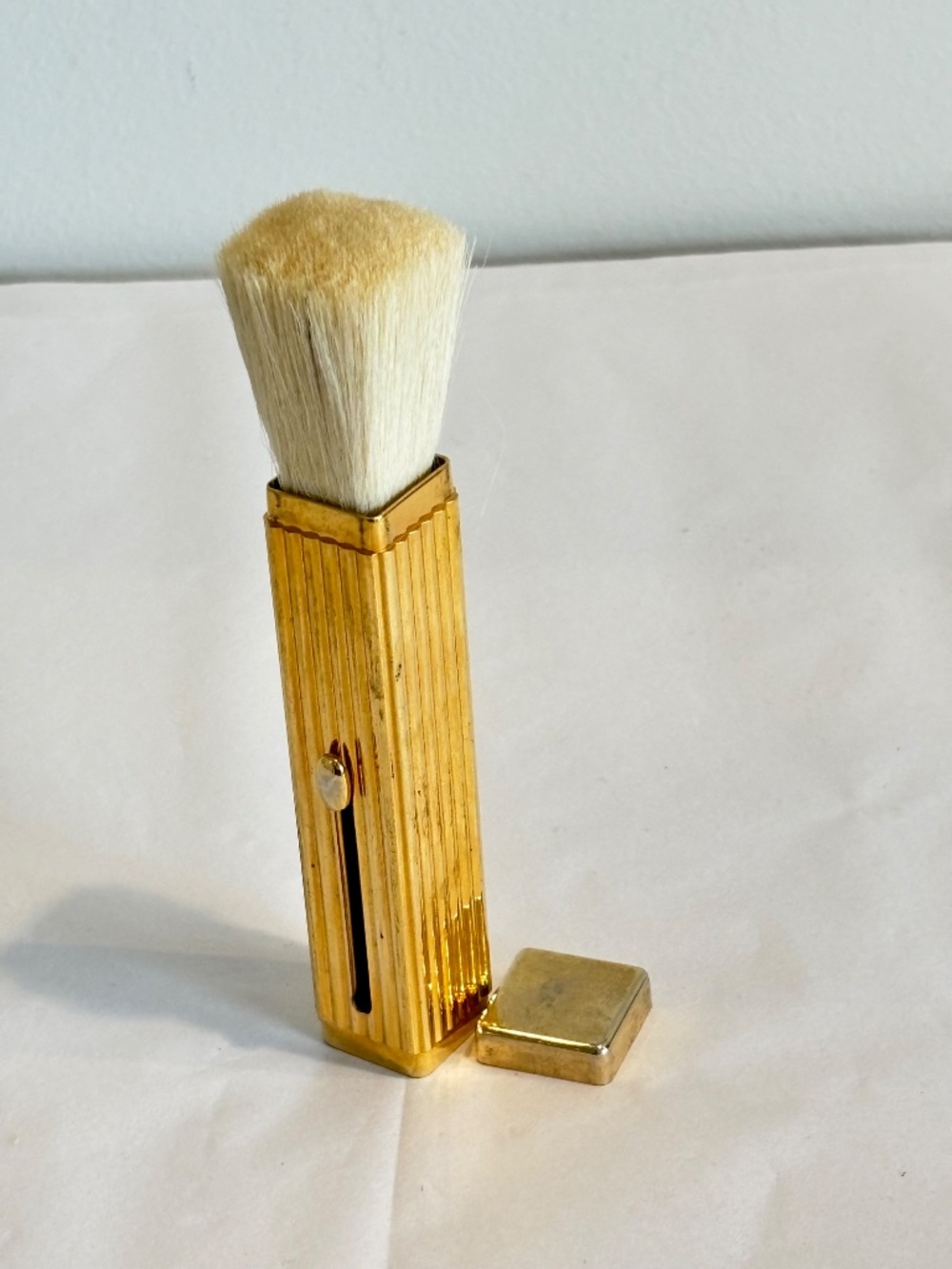Vintage make up brush gold toned retractable cosmetic or face brush ribbed case
